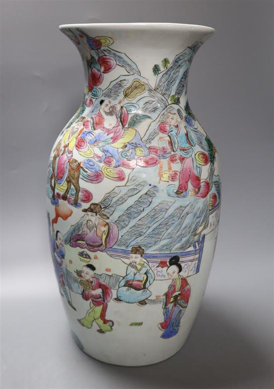 A Chinese porcelain baluster vase, painted with figures in famille rose enamels, height 39cm